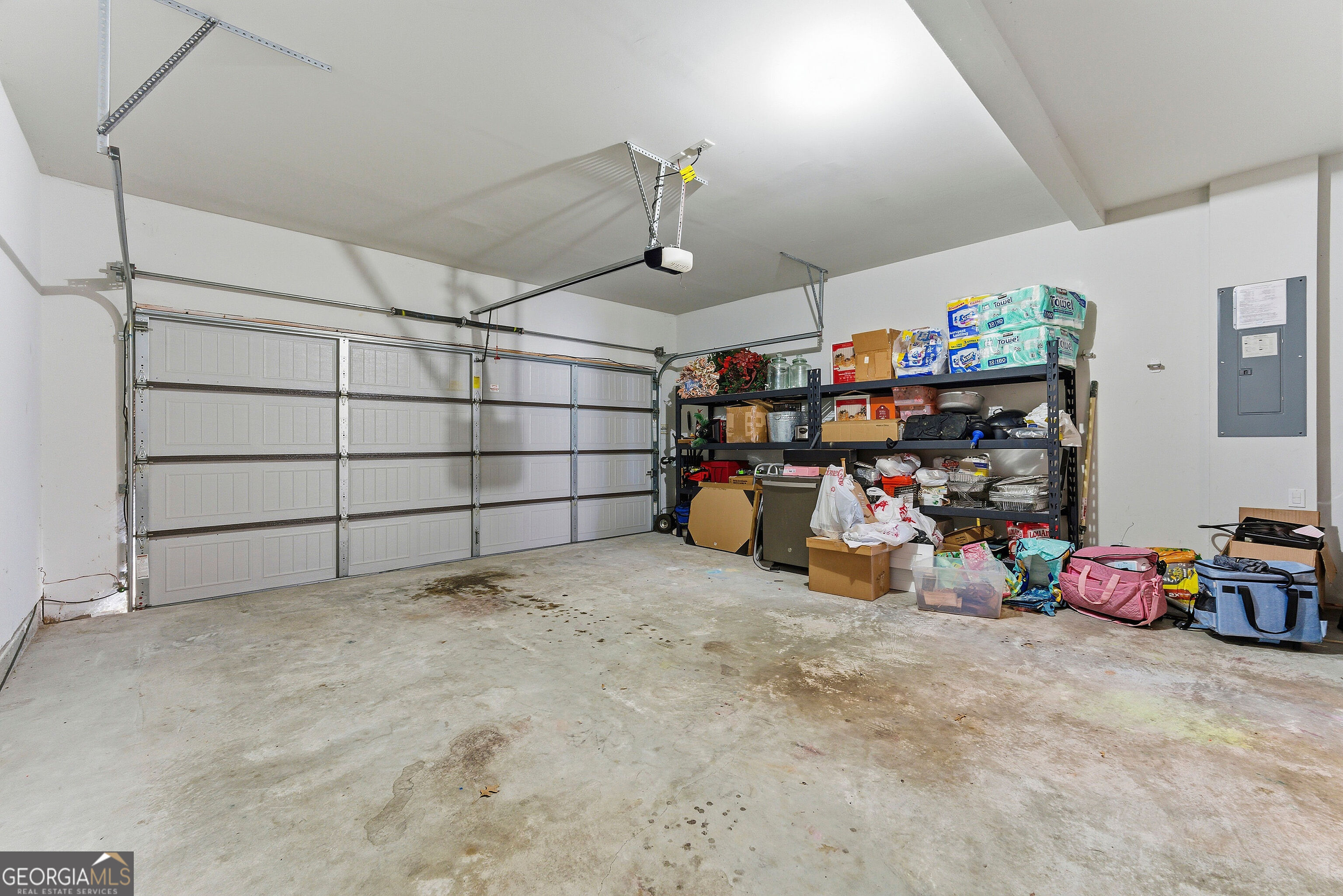 301 Lowell Street Atlanta, GA 30331 - Photo 20 of 28 a view of a garage with rack and bicycle