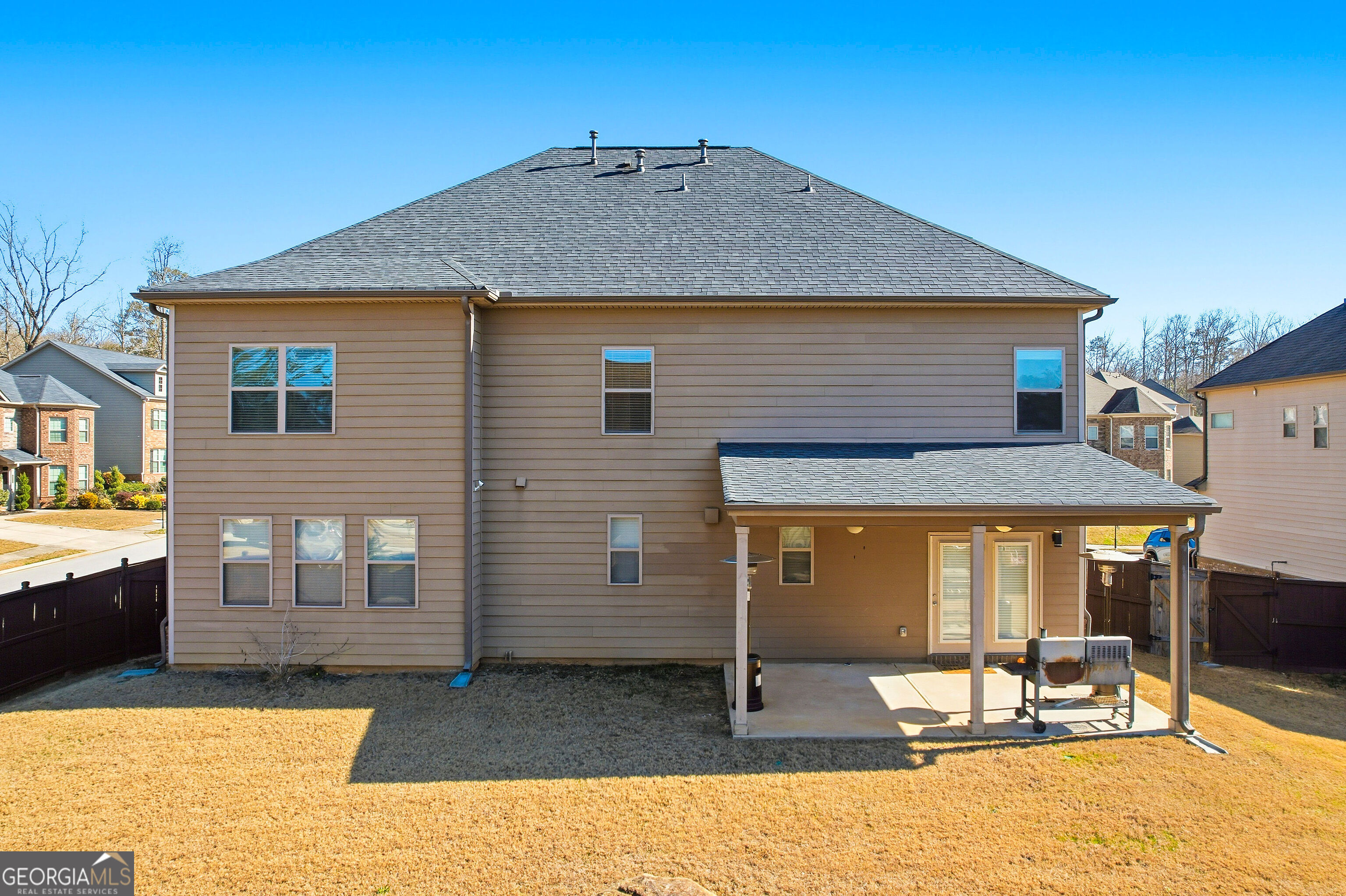 301 Lowell Street Atlanta, GA 30331 - Photo 21 of 28 a backyard of a house with seating space