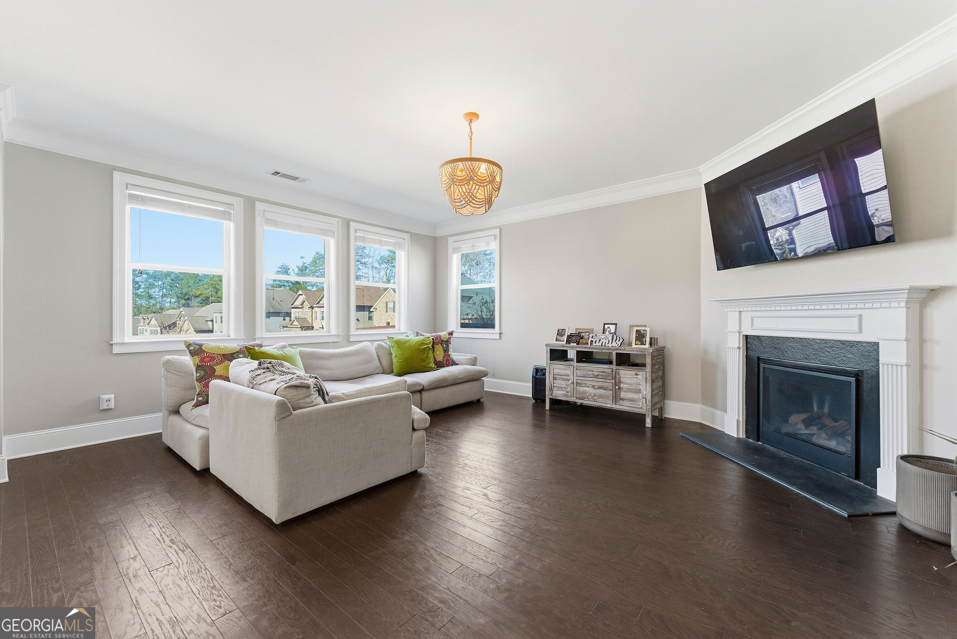 301 Lowell Street Atlanta, GA 30331 - Photo 27 of 28 a living room with furniture and a fireplace