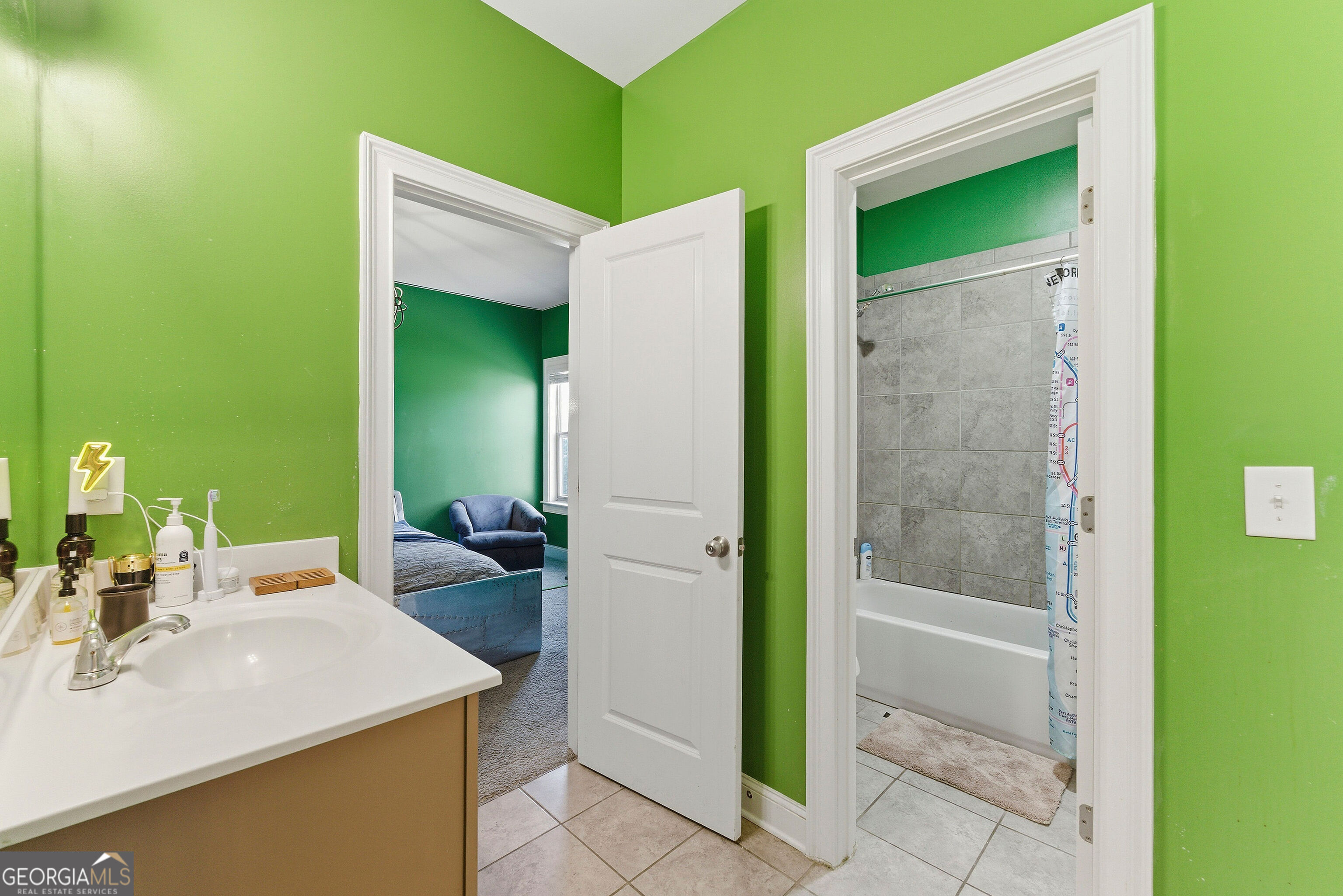 301 Lowell Street Atlanta, GA 30331 - Photo 10 of 28 a bathroom with a sink and a mirror