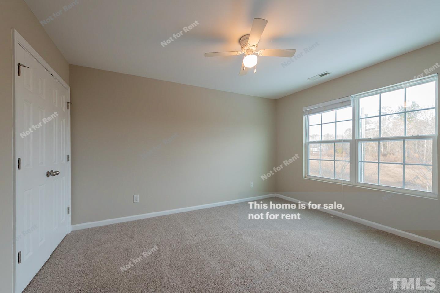 6328 Bunker Hill Drive Raleigh, NC 27610 - Photo 16 of 22 wooden floor in an empty room with a window