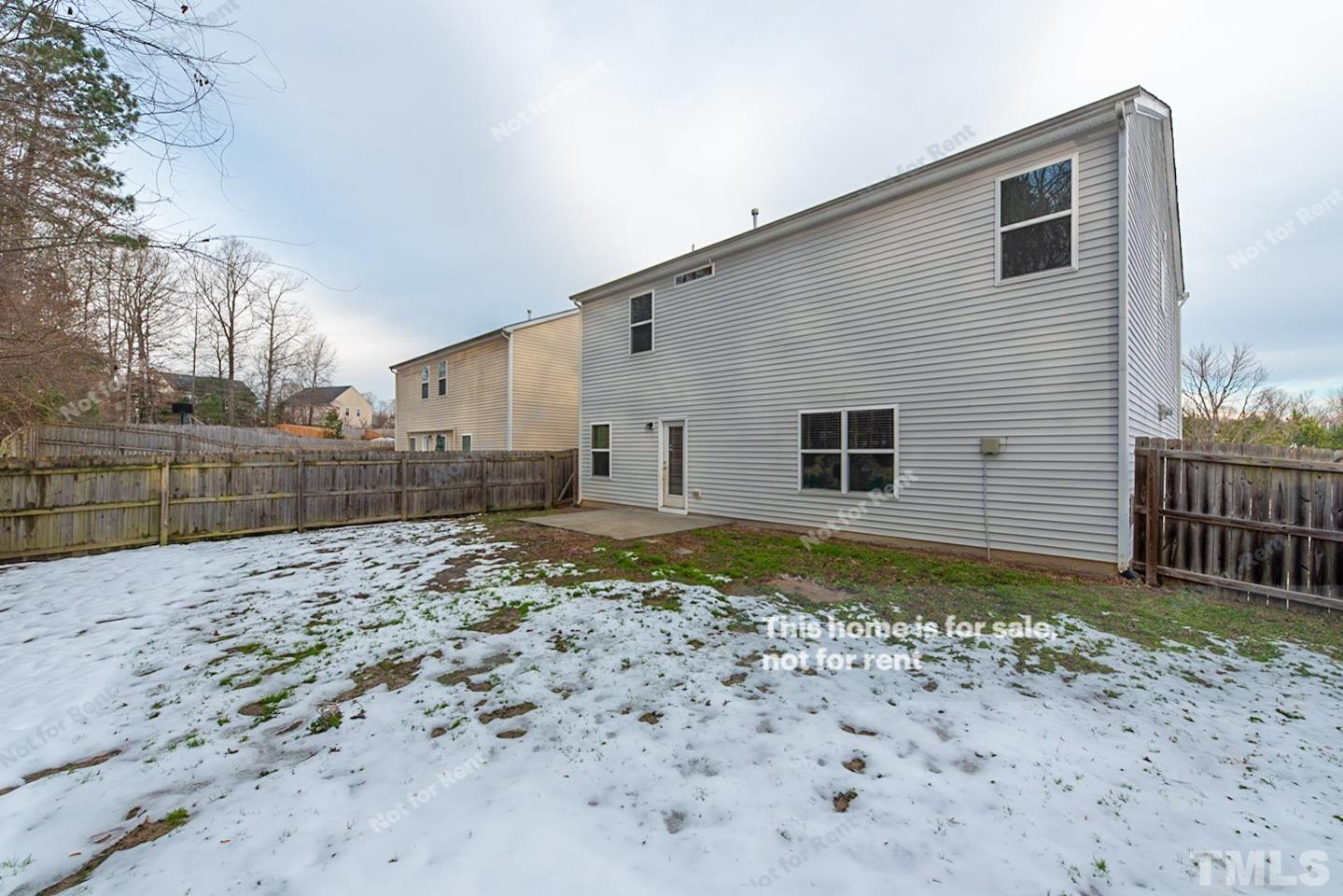 6328 Bunker Hill Drive Raleigh, NC 27610 - Photo 22 of 22 a backyard of a house