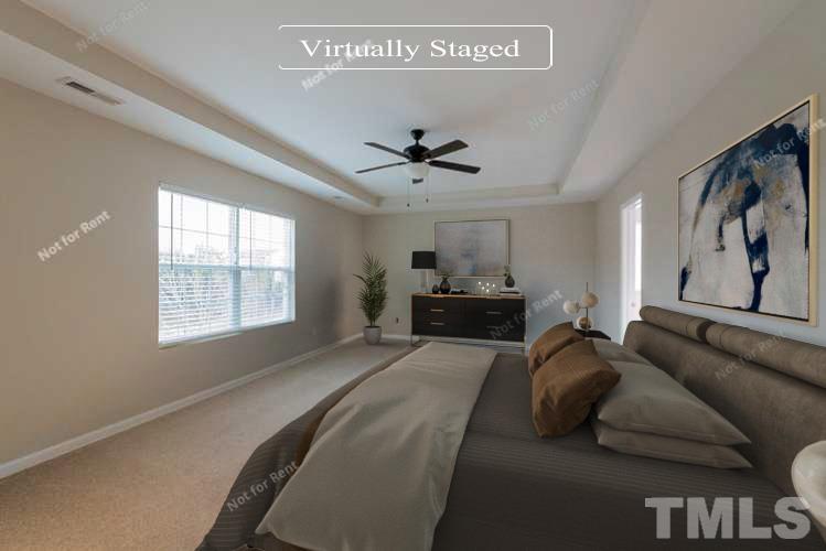 6328 Bunker Hill Drive Raleigh, NC 27610 - Photo 3 of 22 a living room with furniture ceiling fan and a window