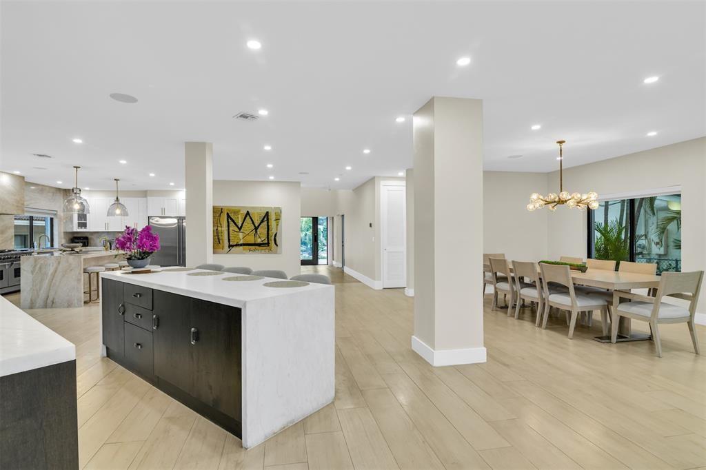 319 South Riverside Drive Pompano Beach, FL 33062 - Photo 15 of 88 a view of kitchen with kitchen island stainless steel appliances a sink and stove