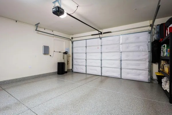 a view of room with toys and a ceiling fan