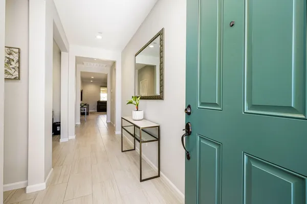 a kitchen with granite countertop a sink and a stove top oven