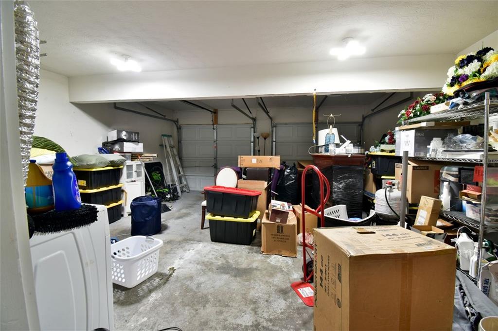 12140 Dominion Drive Hampton, GA 30228 - Photo 28 of 52 a room with storage and utility