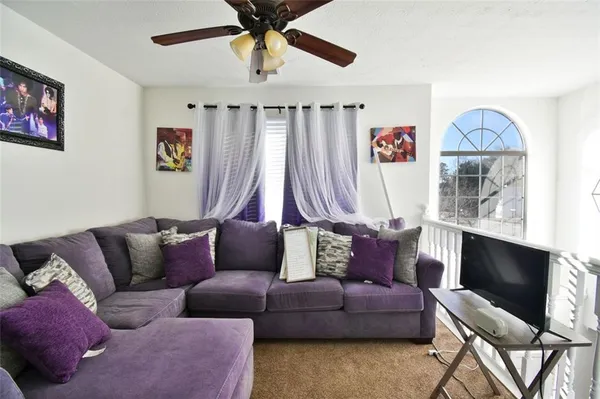 a living room with furniture and a couch