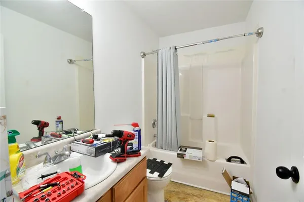 a bed room with a bed and a walk in closet