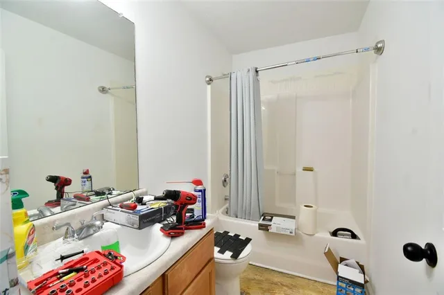 a bed room with a bed and a walk in closet