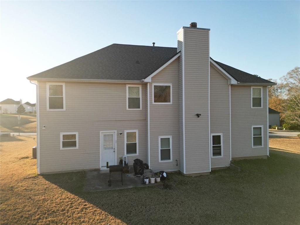 12140 Dominion Drive Hampton, GA 30228 - Photo 4 of 52 a front view of house with yard