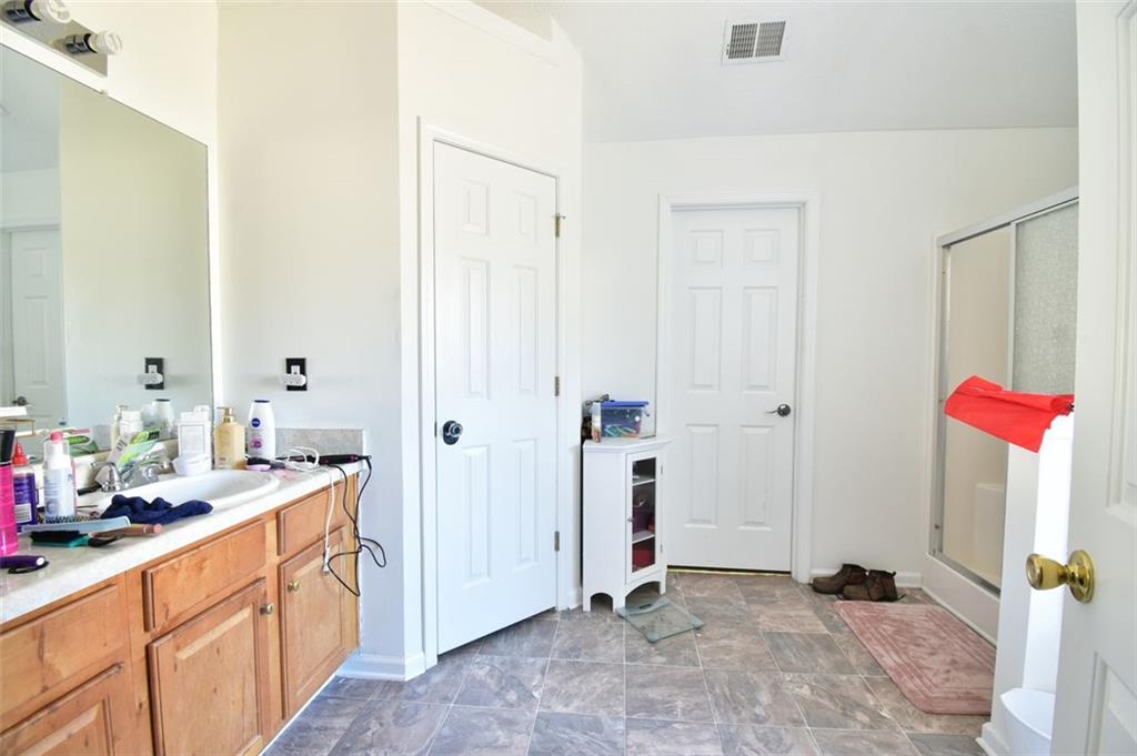 12140 Dominion Drive Hampton, GA 30228 - Photo 47 of 52 a view of a bathroom with a sink