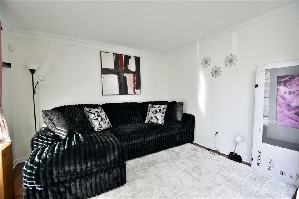 12140 Dominion Drive Hampton, GA 30228 - Photo 9 of 52 a living room with furniture