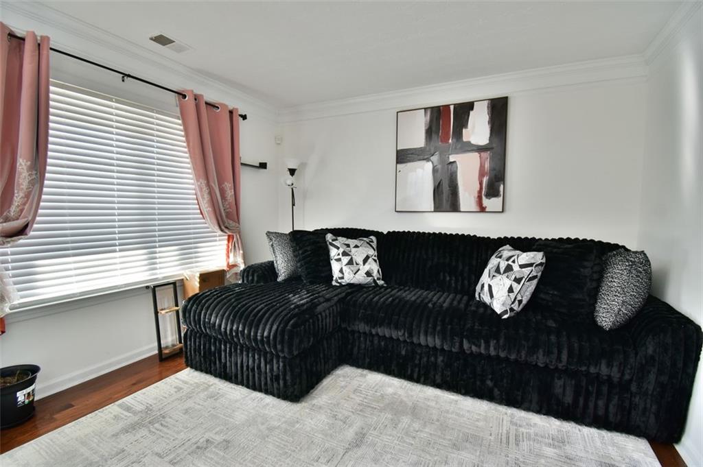 12140 Dominion Drive Hampton, GA 30228 - Photo 10 of 52 a living room with furniture