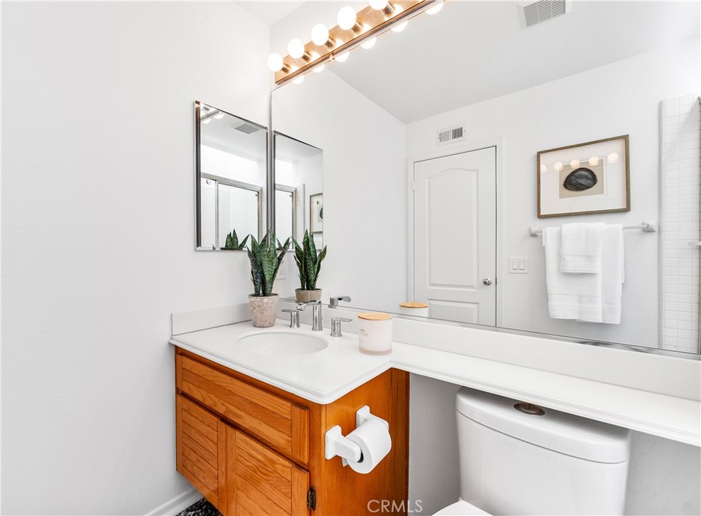 30352 Anamonte Laguna Niguel, CA 92677 - Photo 46 of 69 a bathroom with a sink and a mirror