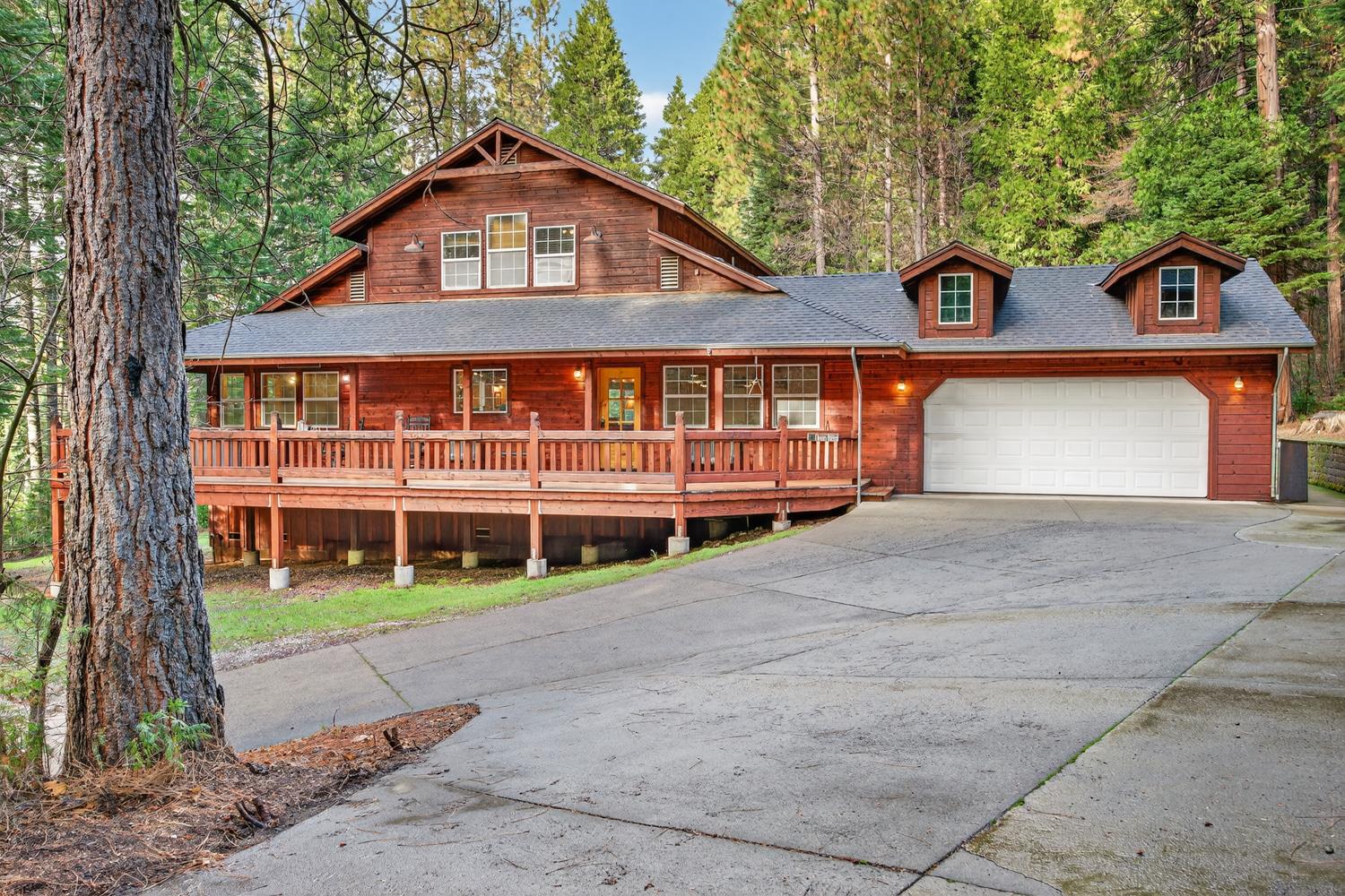 1234 Blagen Road Arnold, CA 95223 - Photo 1 of 1 a front view of a house with garden
