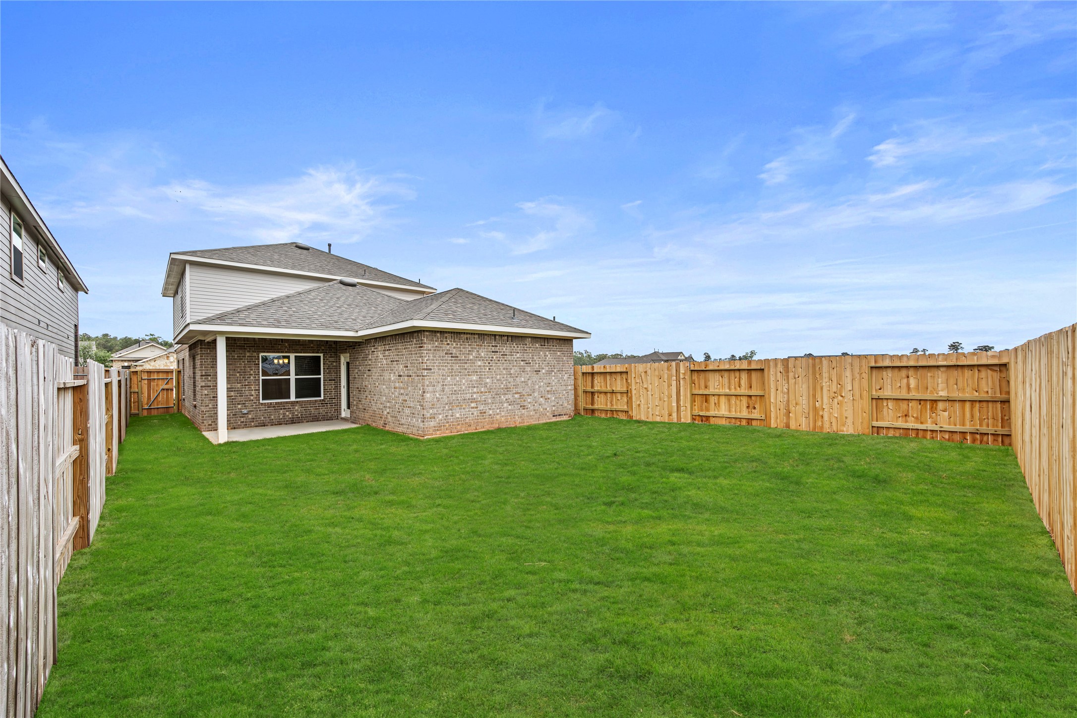 9460 Hard Rock Road Conroe, TX 77303 - Photo 17 of 17 a view of a yard in front of a house