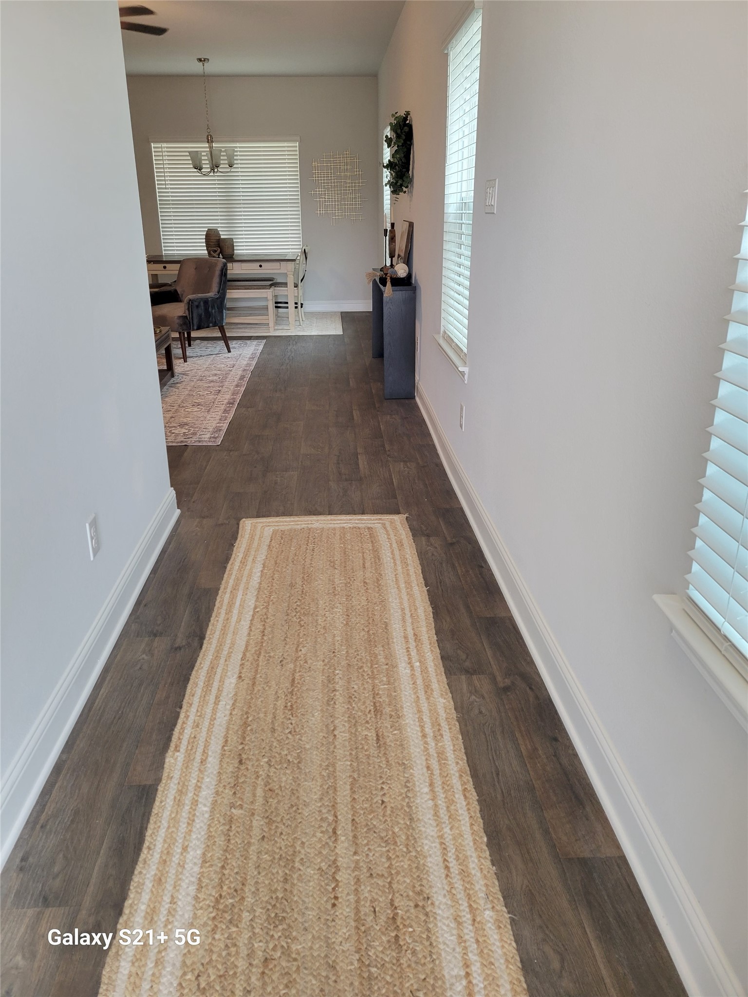 9460 Hard Rock Road Conroe, TX 77303 - Photo 2 of 17 a view of a living room with hardwood floor