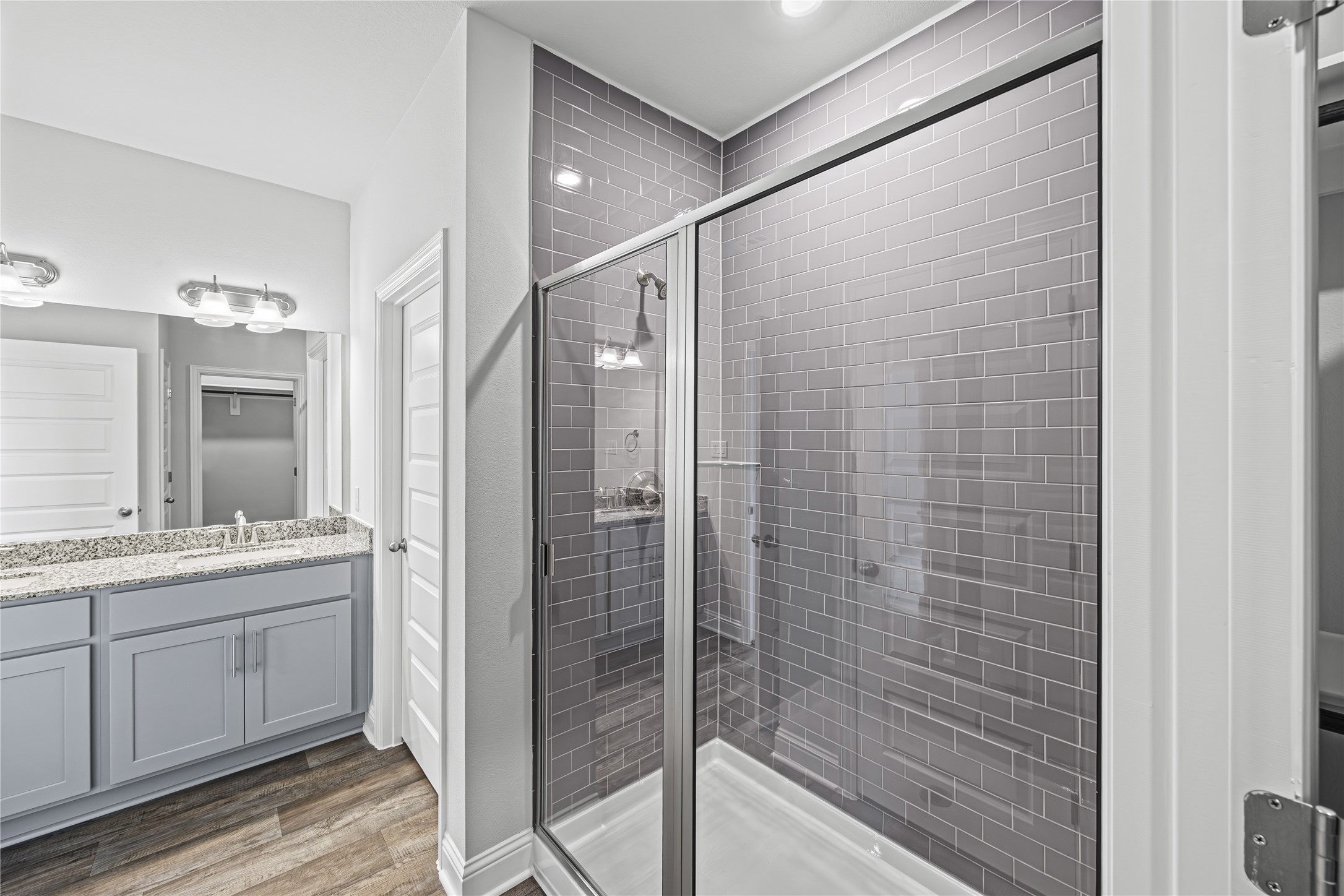 9460 Hard Rock Road Conroe, TX 77303 - Photo 10 of 17 a bathroom with a shower and a sink