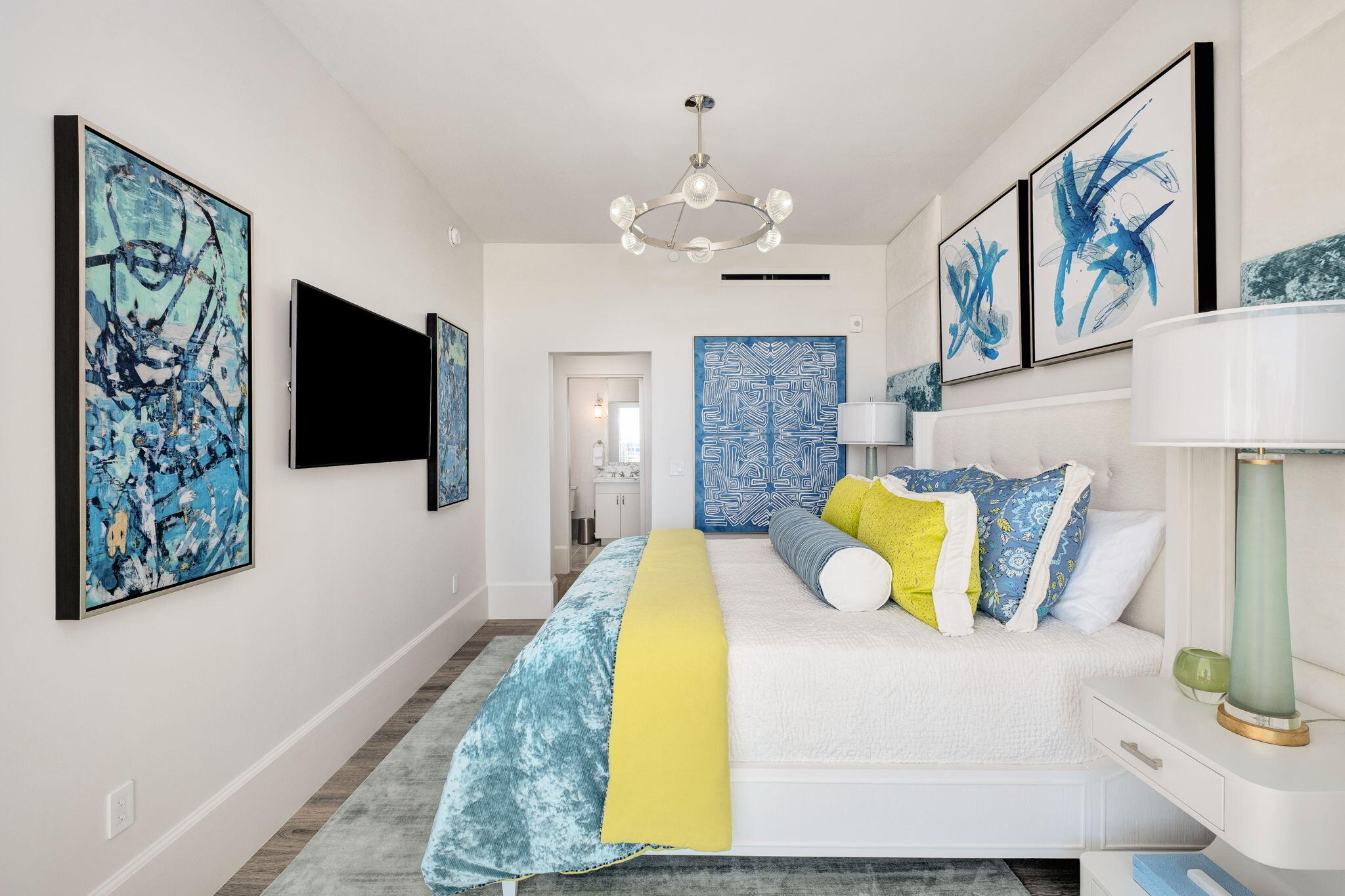 27 Admiralty Row, Unit 302 Alys Beach, FL 32461 - Photo 12 of 33 a bedroom with a bed and a flat screen tv