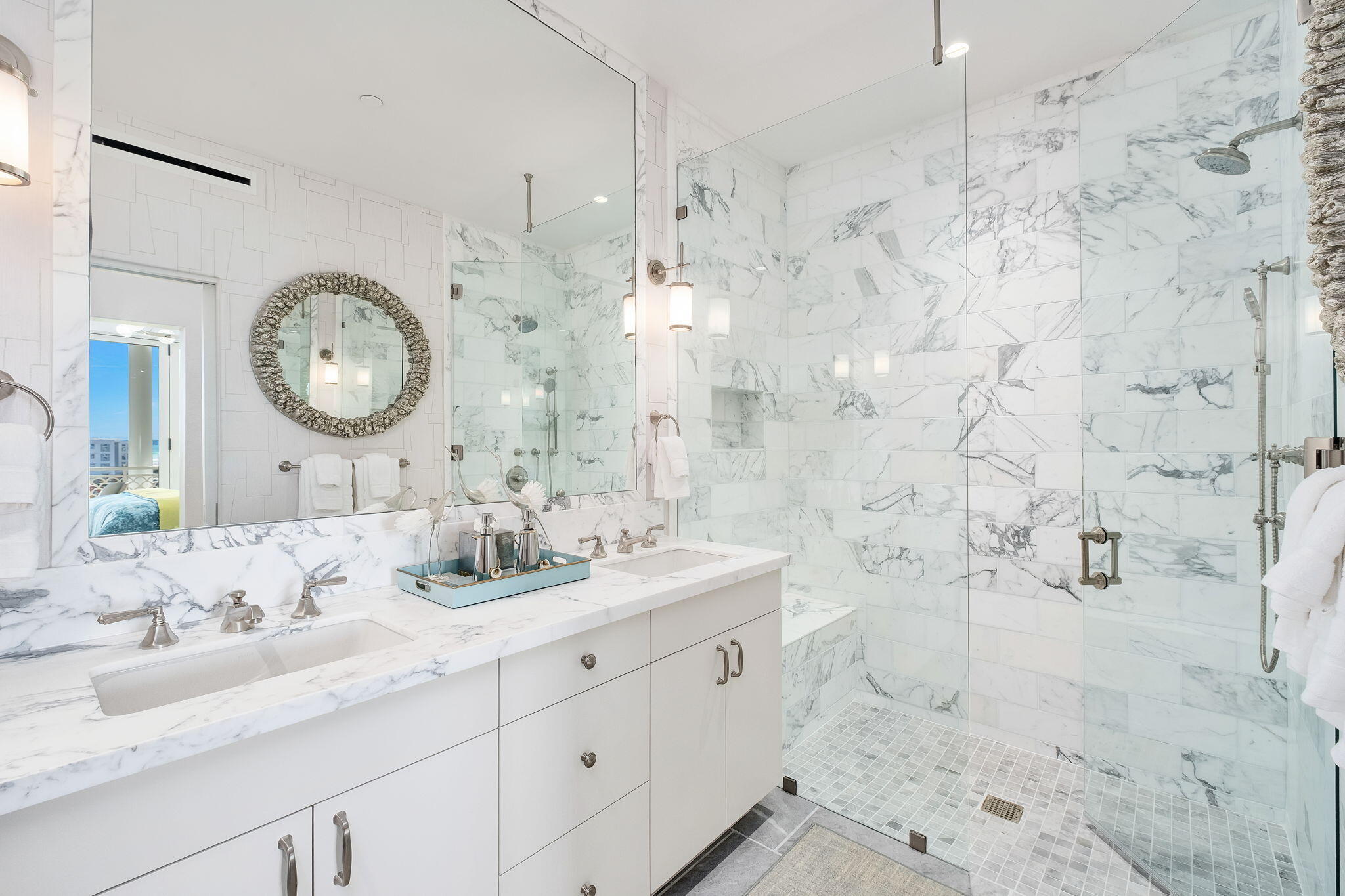 27 Admiralty Row, Unit 302 Alys Beach, FL 32461 - Photo 13 of 33 a bathroom with a double vanity sink mirror and shower