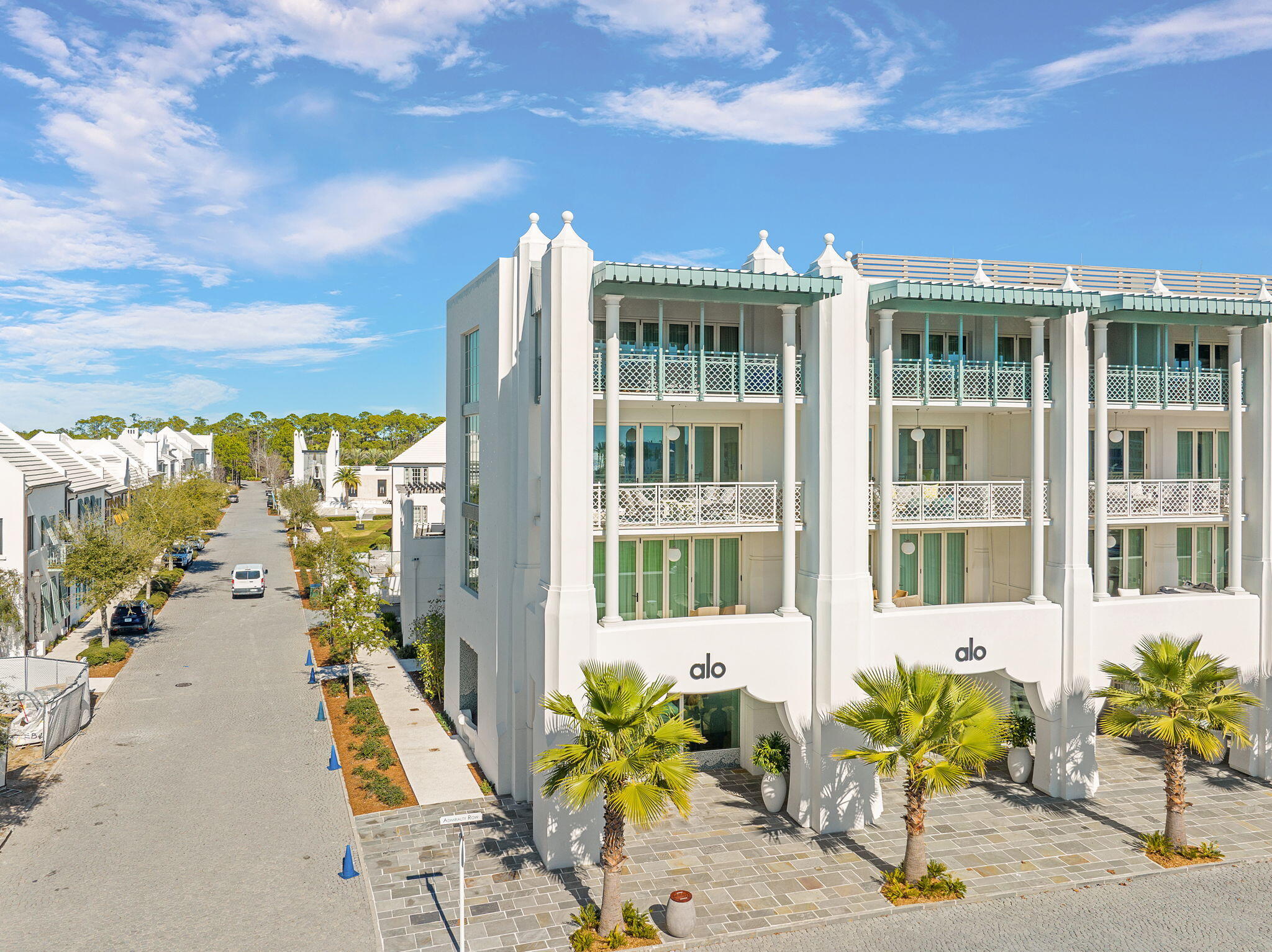 27 Admiralty Row, Unit 302 Alys Beach, FL 32461 - Photo 18 of 33 a view of a building with potted plants