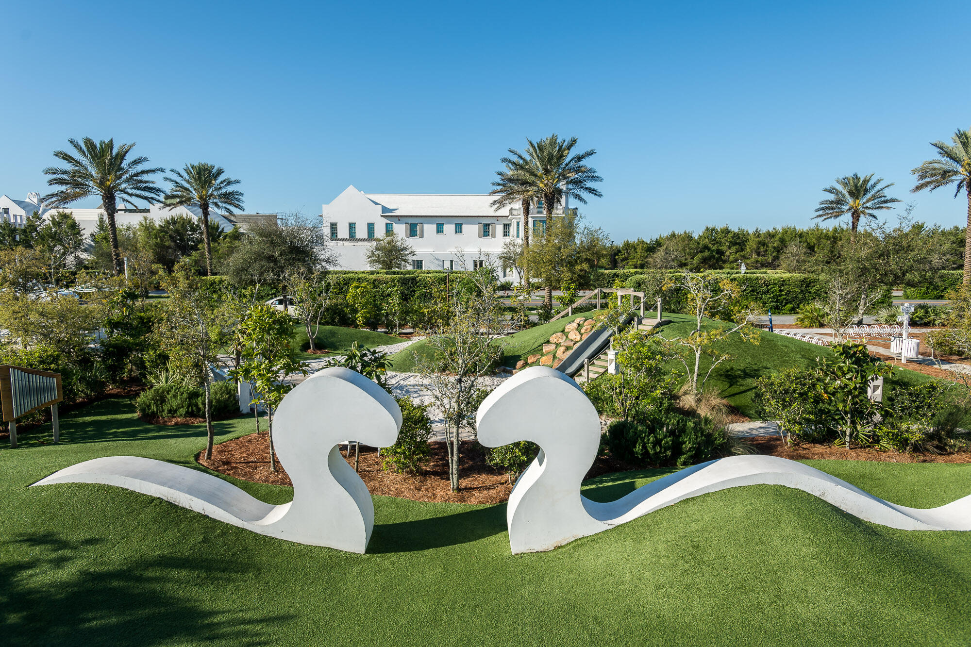 27 Admiralty Row, Unit 302 Alys Beach, FL 32461 - Photo 24 of 33 a view of a house with backyard and swimming pool
