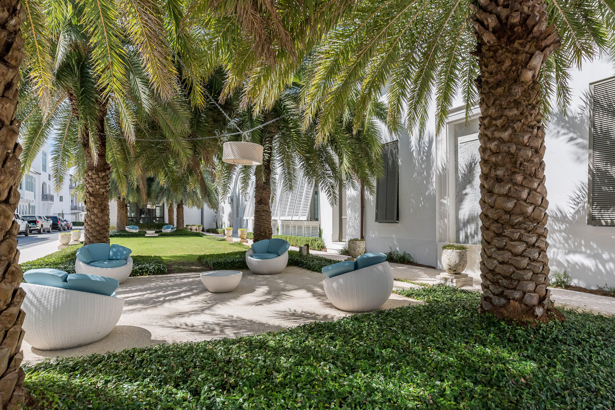 27 Admiralty Row, Unit 302 Alys Beach, FL 32461 - Photo 32 of 33 a view of a backyard with sitting area and garden