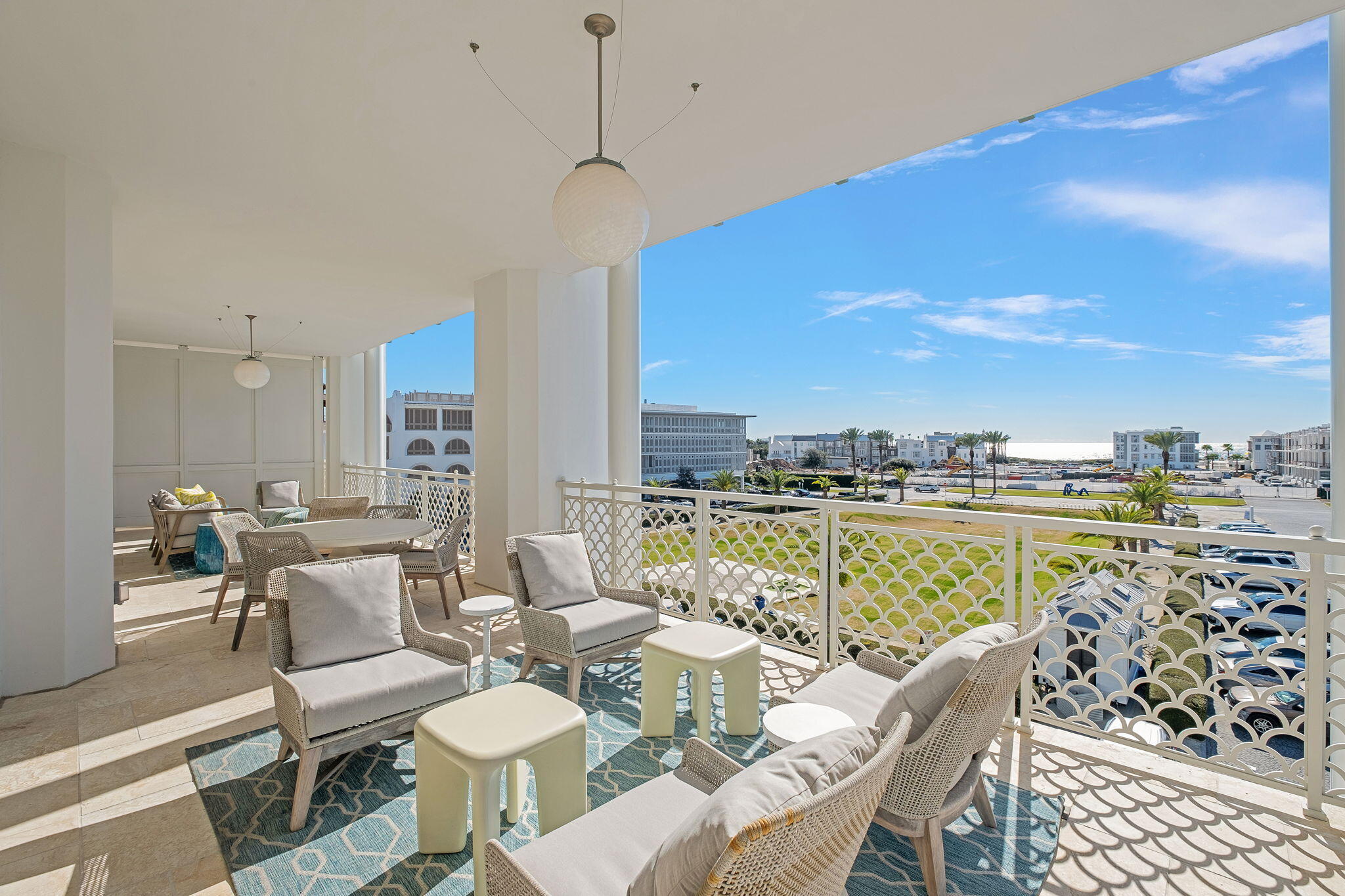 27 Admiralty Row, Unit 302 Alys Beach, FL 32461 - Photo 9 of 33 a view of a dining room with furniture water and mountain view