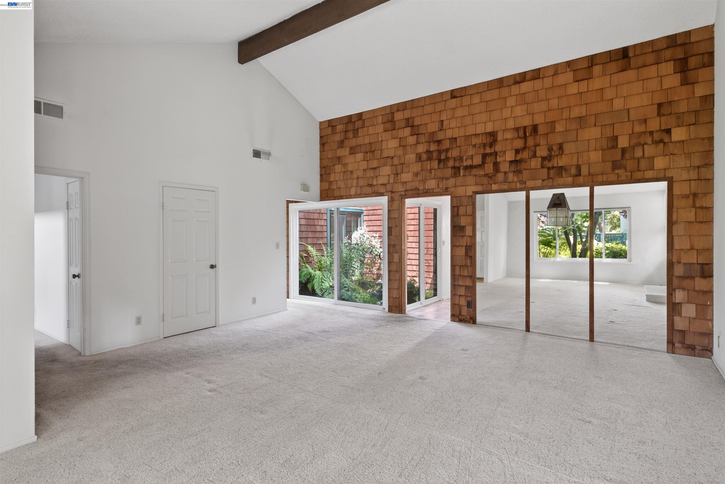 202 Baywood Road Alameda, CA 94502 - Photo 11 of 26 a view of an empty room with windows