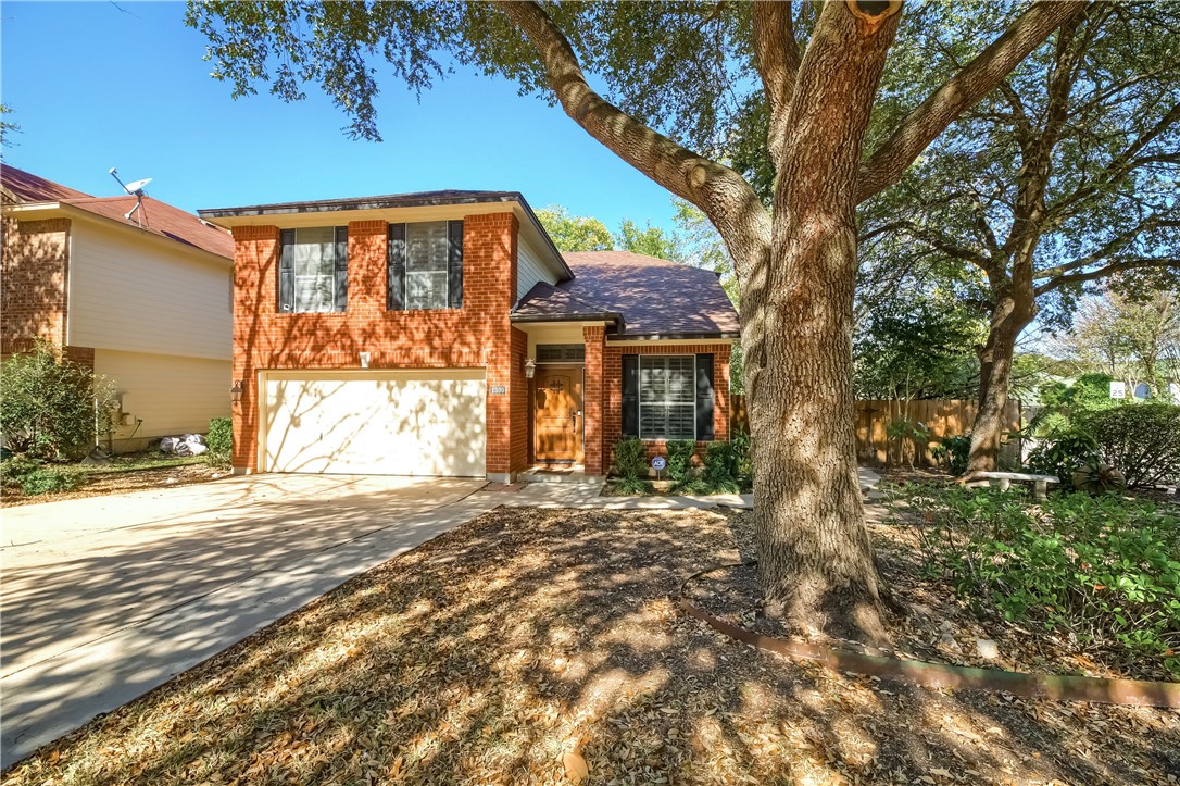 1300 Strickland Drive Austin, TX 78748 - Photo 1 of 1 a front view of a house with a yard