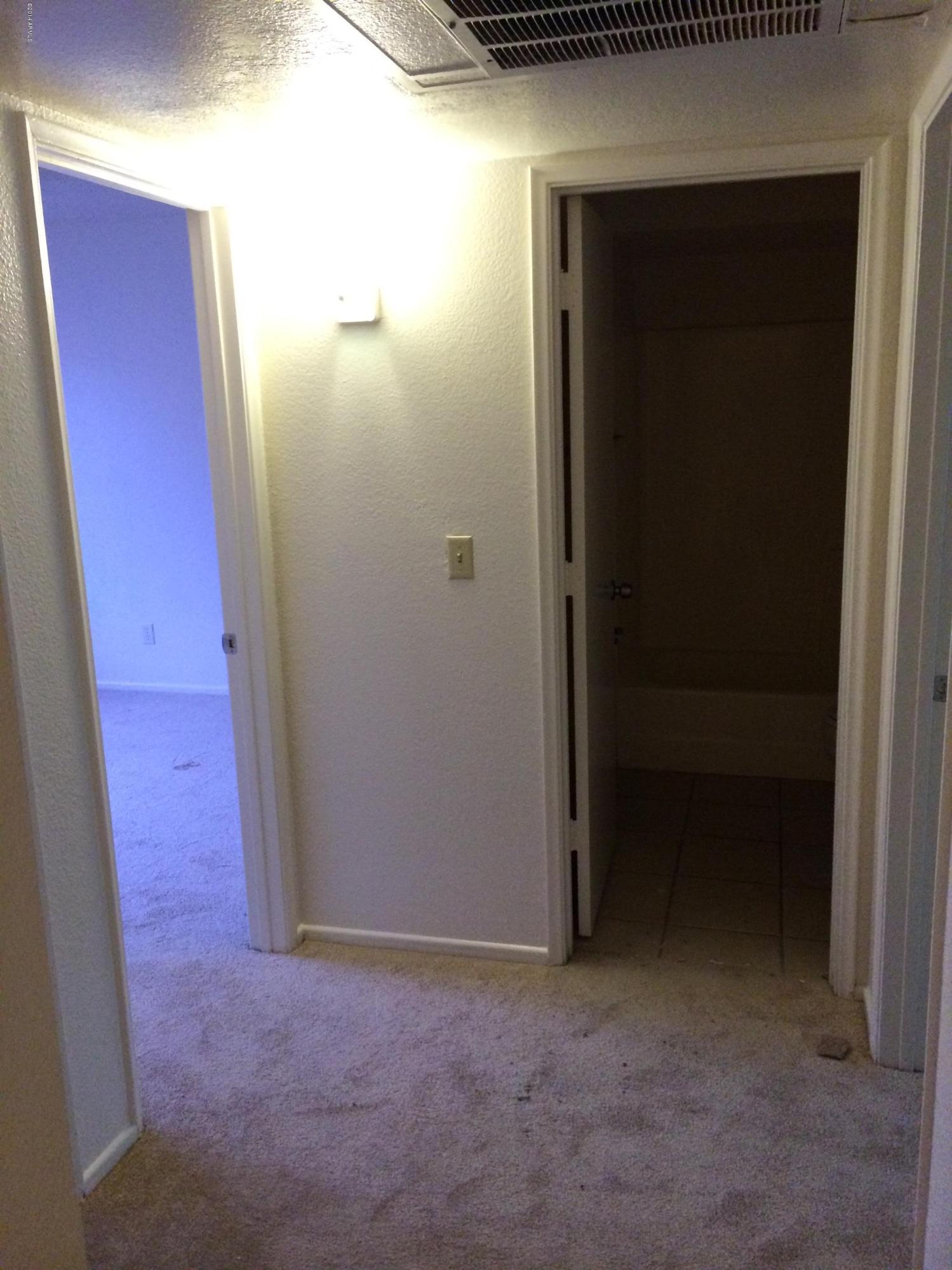 19601 North 7th Street, Unit 1085 Phoenix, AZ 85024 - Photo 17 of 23 an empty room with closet