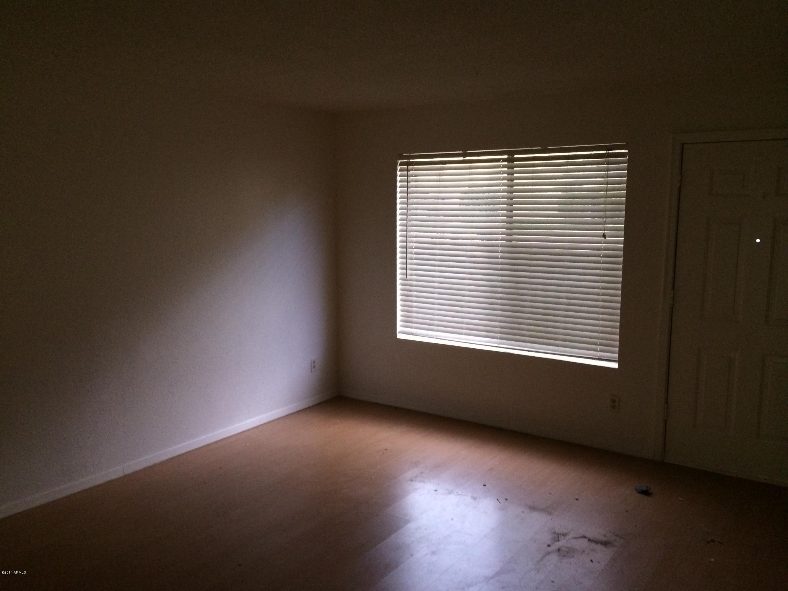 19601 North 7th Street, Unit 1085 Phoenix, AZ 85024 - Photo 7 of 23 a view of an empty room with a window