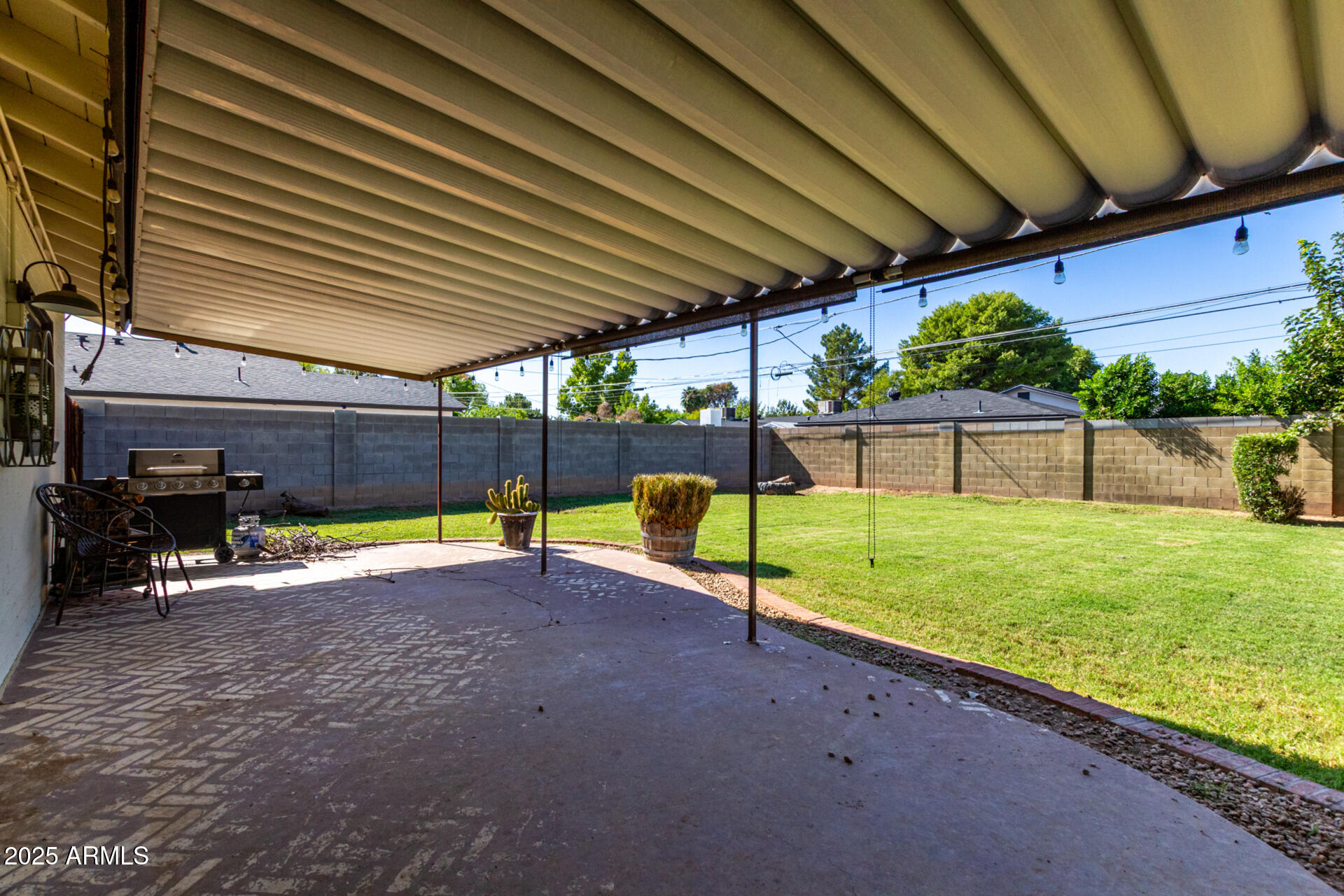 3718 North 36th Street Phoenix, AZ 85018 - Photo 18 of 37 a view of a backyard with swimming pool