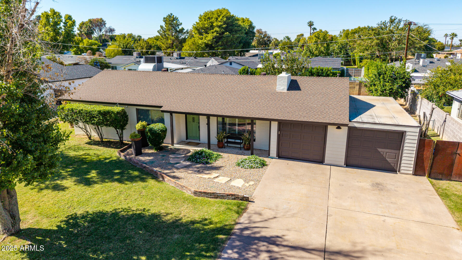 3718 North 36th Street Phoenix, AZ 85018 - Photo 21 of 37 a aerial view of a house with swimming pool garden and patio