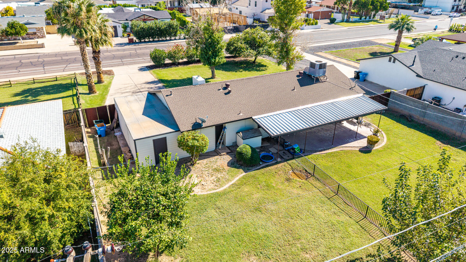 3718 North 36th Street Phoenix, AZ 85018 - Photo 26 of 37 an aerial view of a house with a swimming pool