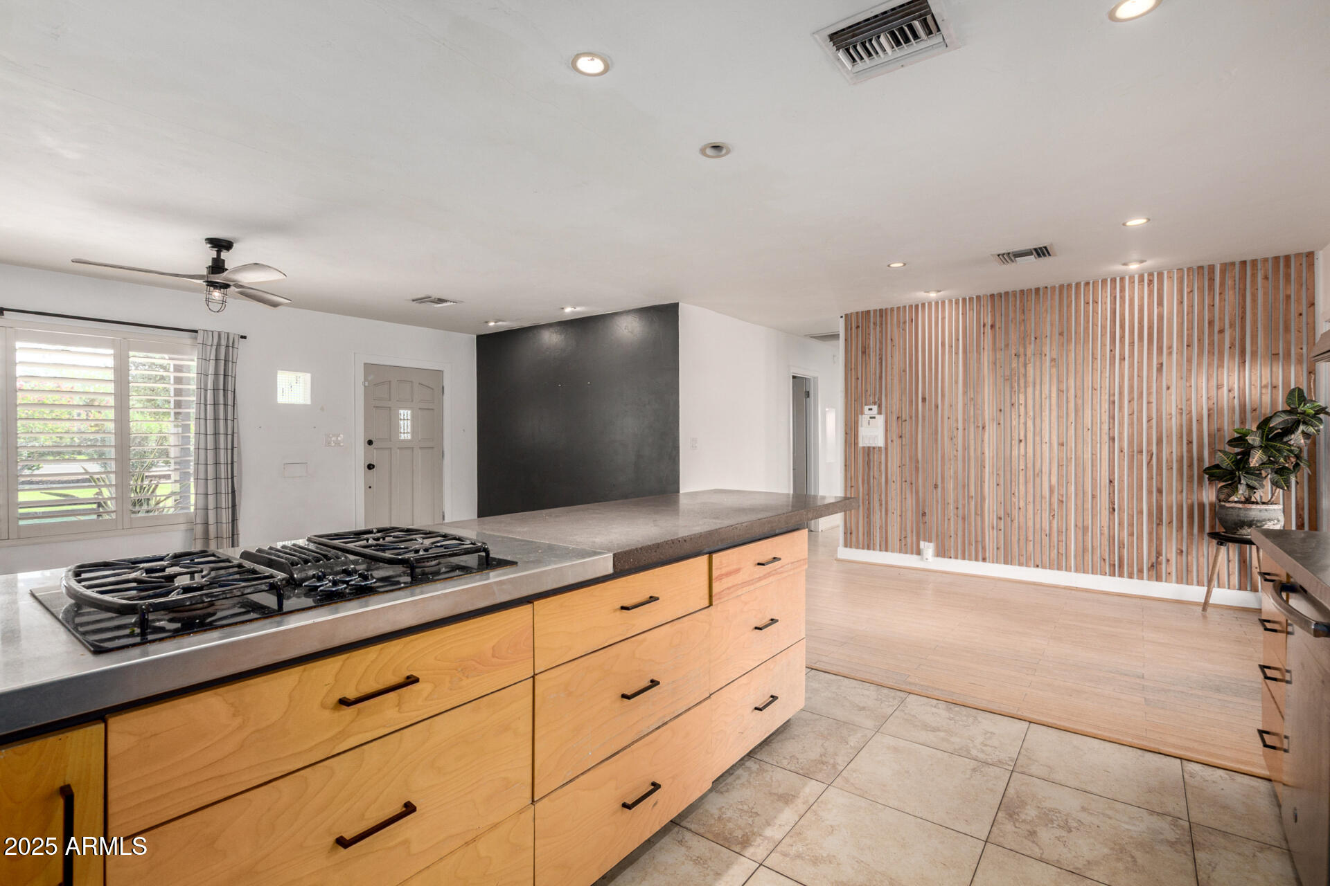 3718 North 36th Street Phoenix, AZ 85018 - Photo 9 of 37 a kitchen with stainless steel appliances granite countertop a stove and a sink