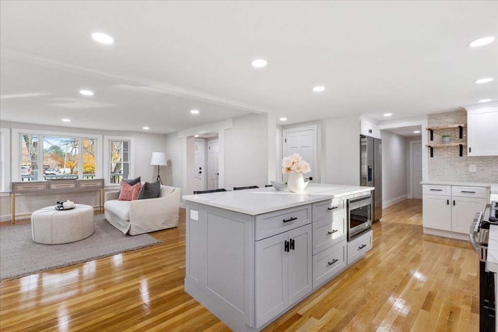 964 Main Street Hanover, MA 02339 - Photo 11 of 35 a large white kitchen with stainless steel appliances granite countertop a lot of counter top space