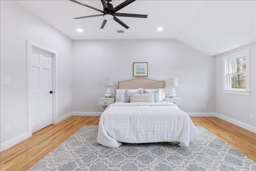 964 Main Street Hanover, MA 02339 - Photo 18 of 35 a bedroom with a bed and painting on the wall