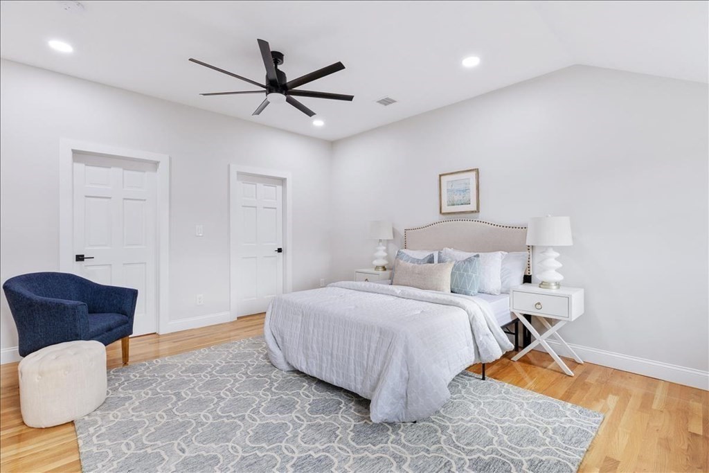 964 Main Street Hanover, MA 02339 - Photo 19 of 35 a bedroom with a bed and a couch