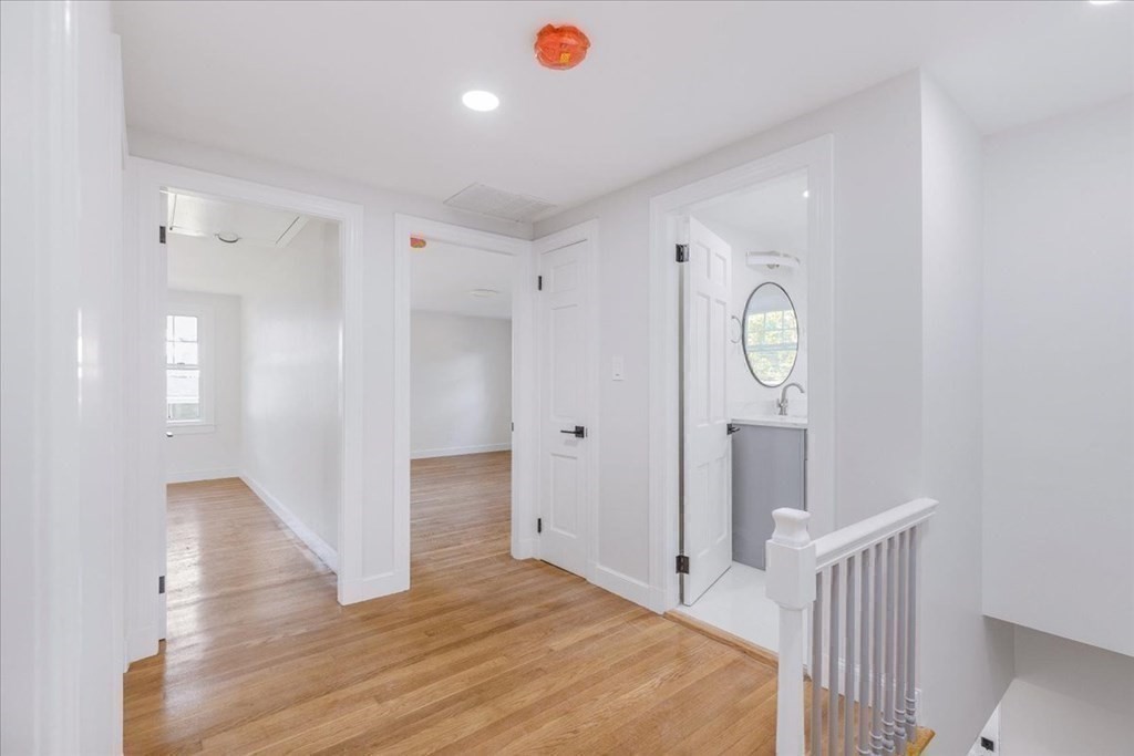 964 Main Street Hanover, MA 02339 - Photo 24 of 35 a view of a hallway with wooden floor