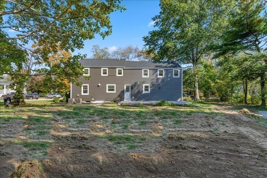 964 Main Street Hanover, MA 02339 - Photo 29 of 35 a view of a house with a yard