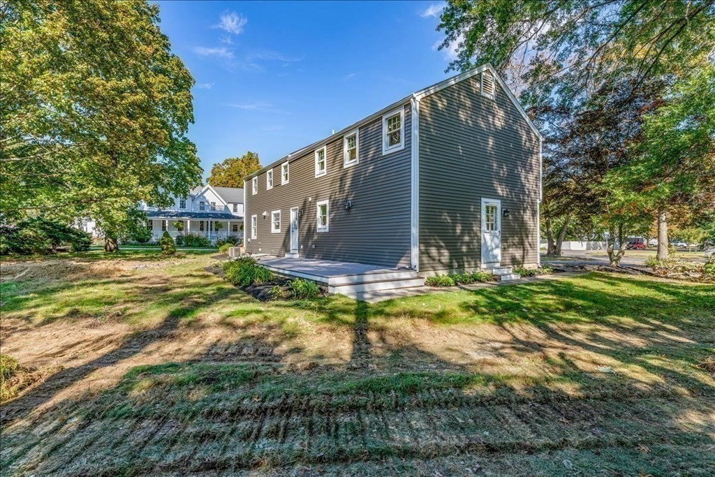 964 Main Street Hanover, MA 02339 - Photo 30 of 35 a view of a house with a yard