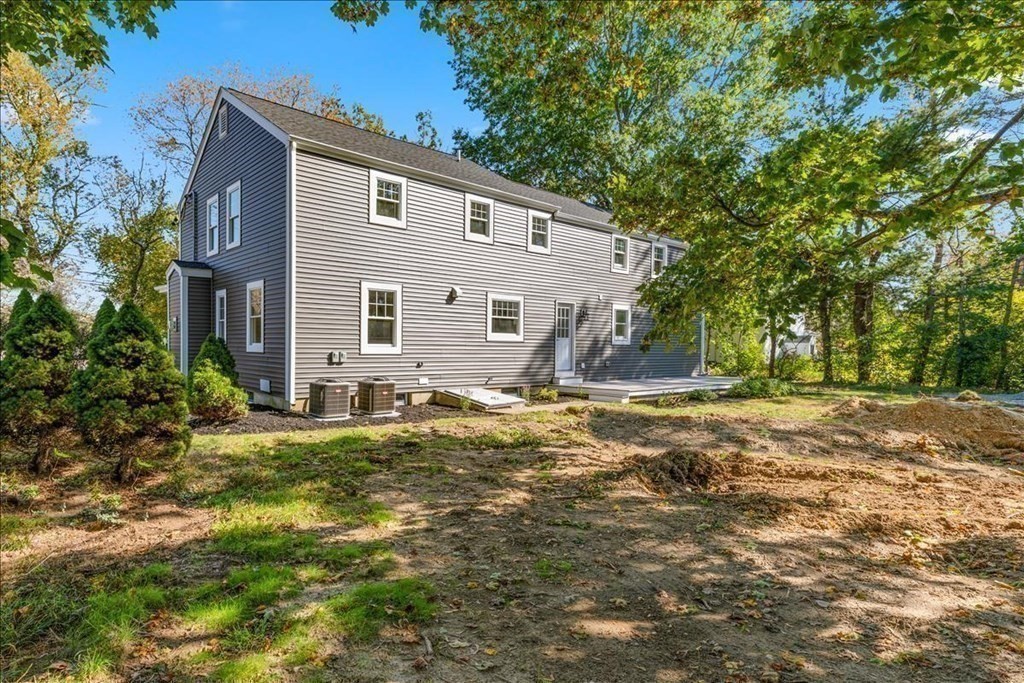 964 Main Street Hanover, MA 02339 - Photo 31 of 35 a view of a house with a yard