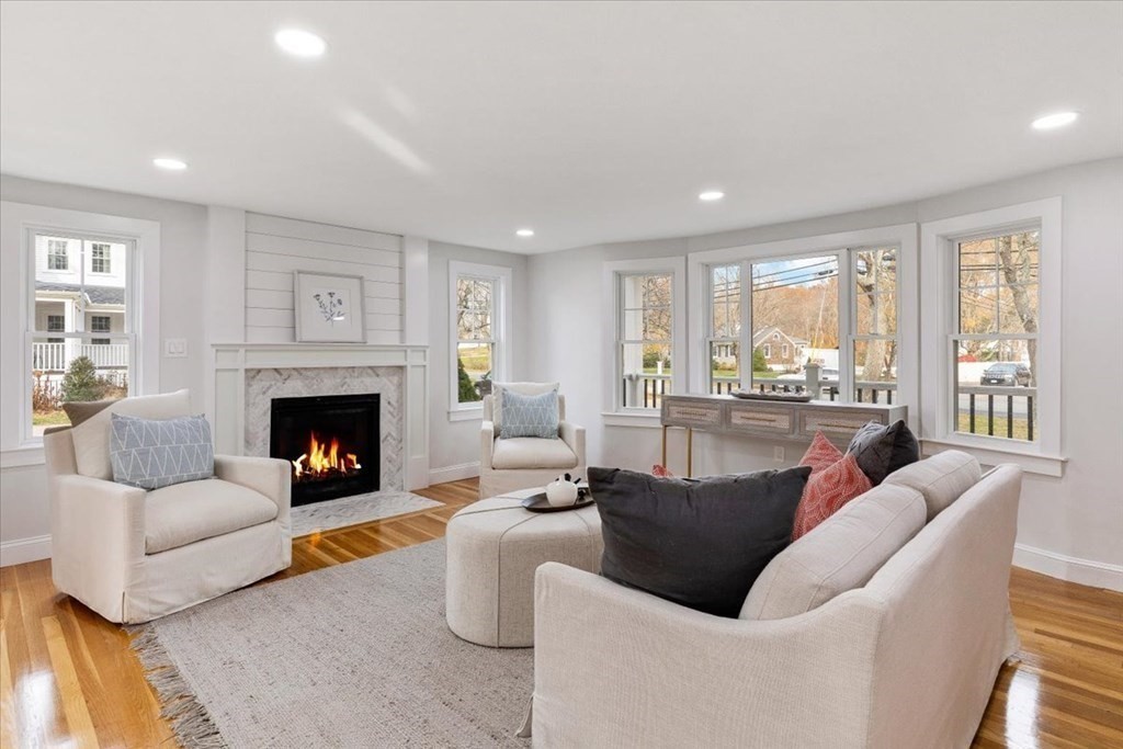 964 Main Street Hanover, MA 02339 - Photo 6 of 35 a living room with fireplace furniture and a large window