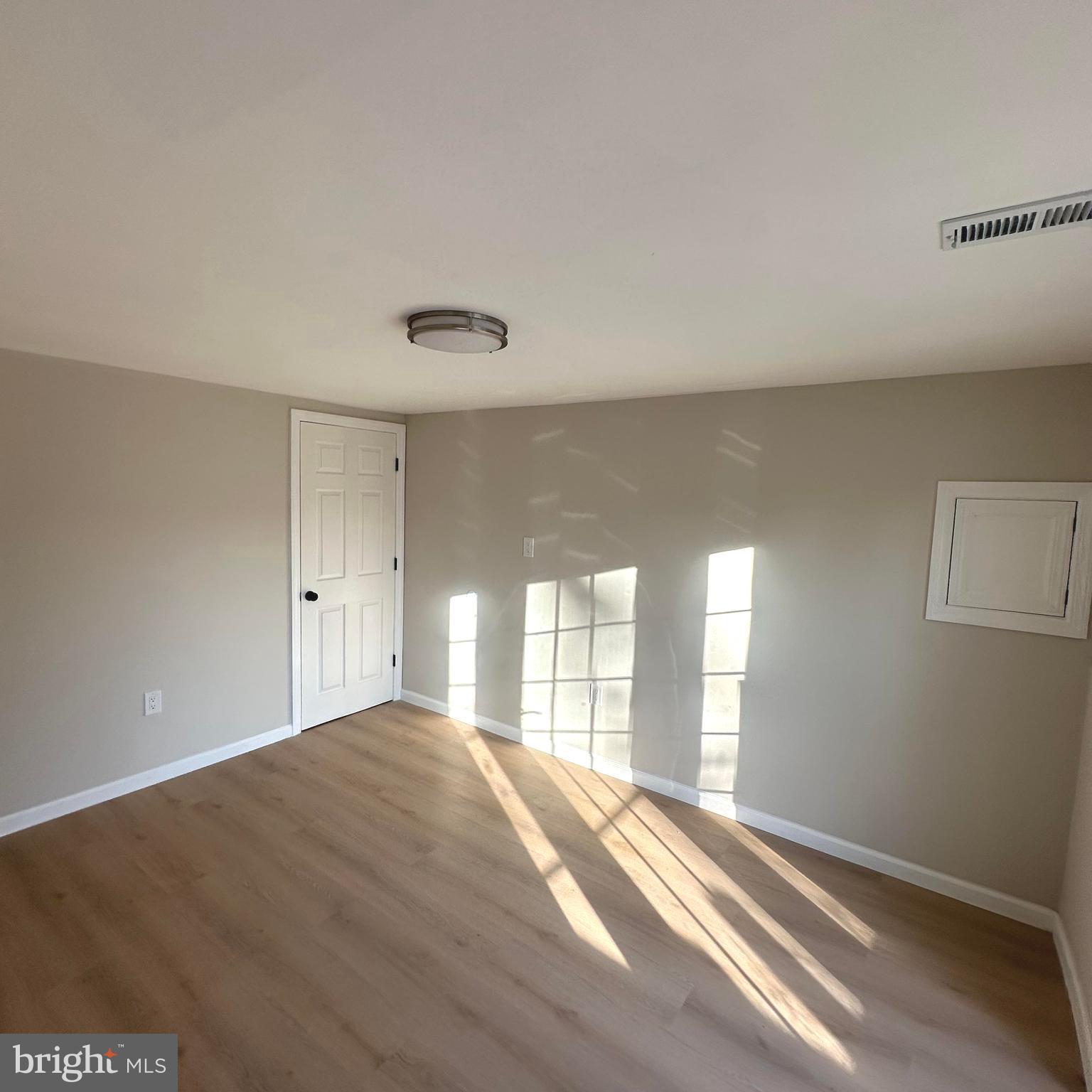 409 Cornwall Road Cherry Hill, NJ 08034 - Photo 12 of 26 a view of empty room with wooden floor and fan