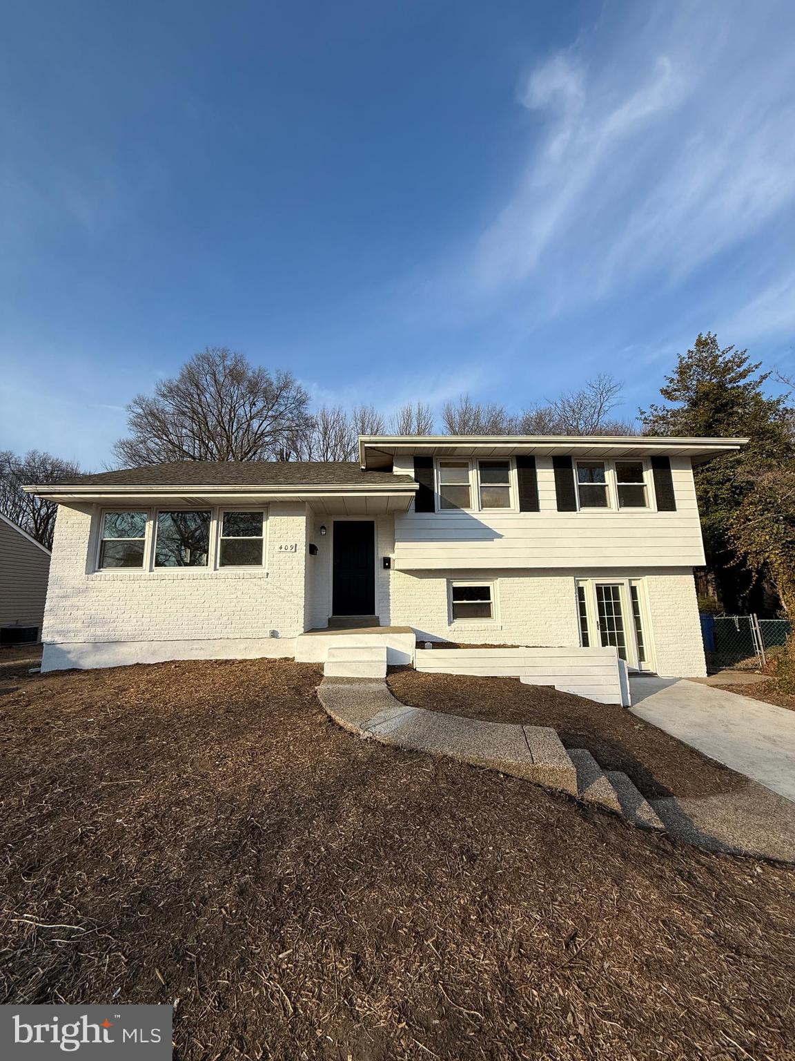 409 Cornwall Road Cherry Hill, NJ 08034 - Photo 25 of 26 a house with a big yard and large trees