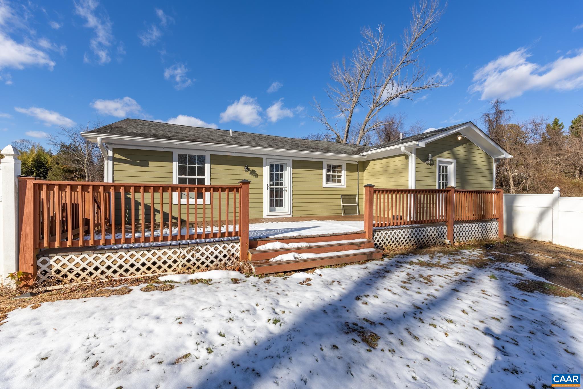 703 Tilman Road Charlottesville, VA 22901 - Photo 32 of 37 a view of a house with a wooden fence