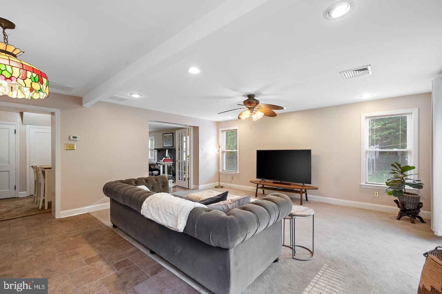 181 East Conestoga Road Wayne, PA 19087 - Photo 11 of 34 a living room with furniture and a flat screen tv
