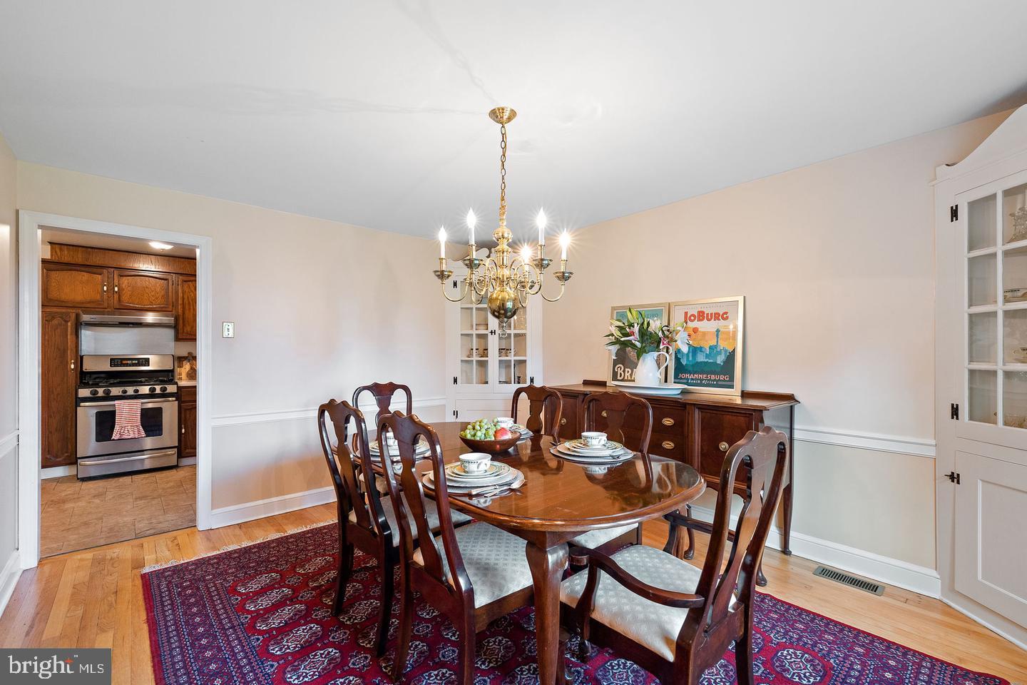 181 East Conestoga Road Wayne, PA 19087 - Photo 16 of 34 a view of a dining room with furniture and chandelier